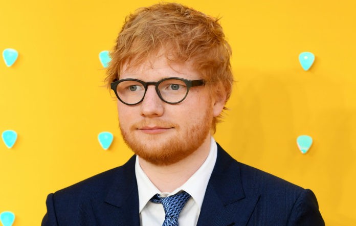 Ed Sheeran returns to cat cafe 10 years later to impress felines with a song